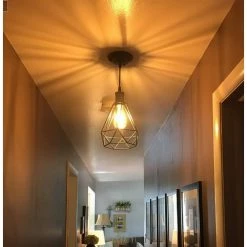 8.66 in. 1-Light Black Island Wrought Iron Mesh Geometric Cage Pendant Light by YANSUN -YANSUN Shop black yansun chandeliers h dz044n1 1f 1000