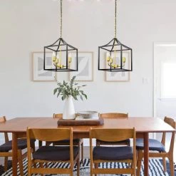 3-Light Black Lantern Caged Metal Pendant with Gold Candle Sleeves by YANSUN 11 3-Light Black Lantern Caged Metal Pendant with Gold Candle Sleeves by YANSUN -YANSUN Shop black yansun chandeliers h dz092 e1 1000