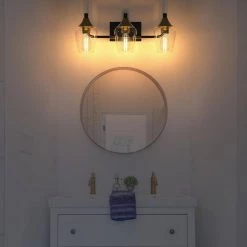 28.35 in. 3-Light Black Industrial Metal Bathroom Wall Sconce with Aged Brass Socket Cups and Clear Glass Shade(2-Pack) by YANSUN 16 28.35 in. 3-Light Black Industrial Metal Bathroom Wall Sconce with Aged Brass Socket Cups and Clear Glass Shade(2-Pack) by YANSUN -YANSUN Shop black yansun wall sconces h wl026n1 fa 1000